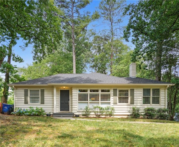 front view of a house with a yard