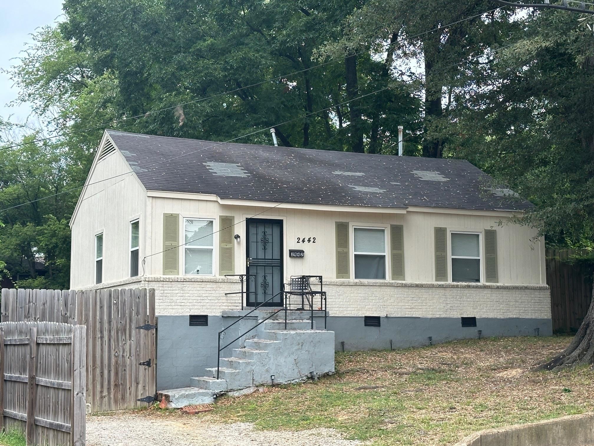 a view of a house with a patio