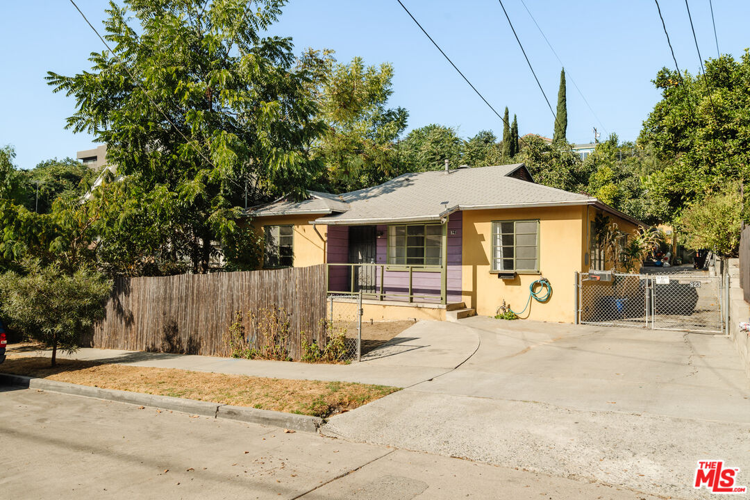 a house with trees in front of it