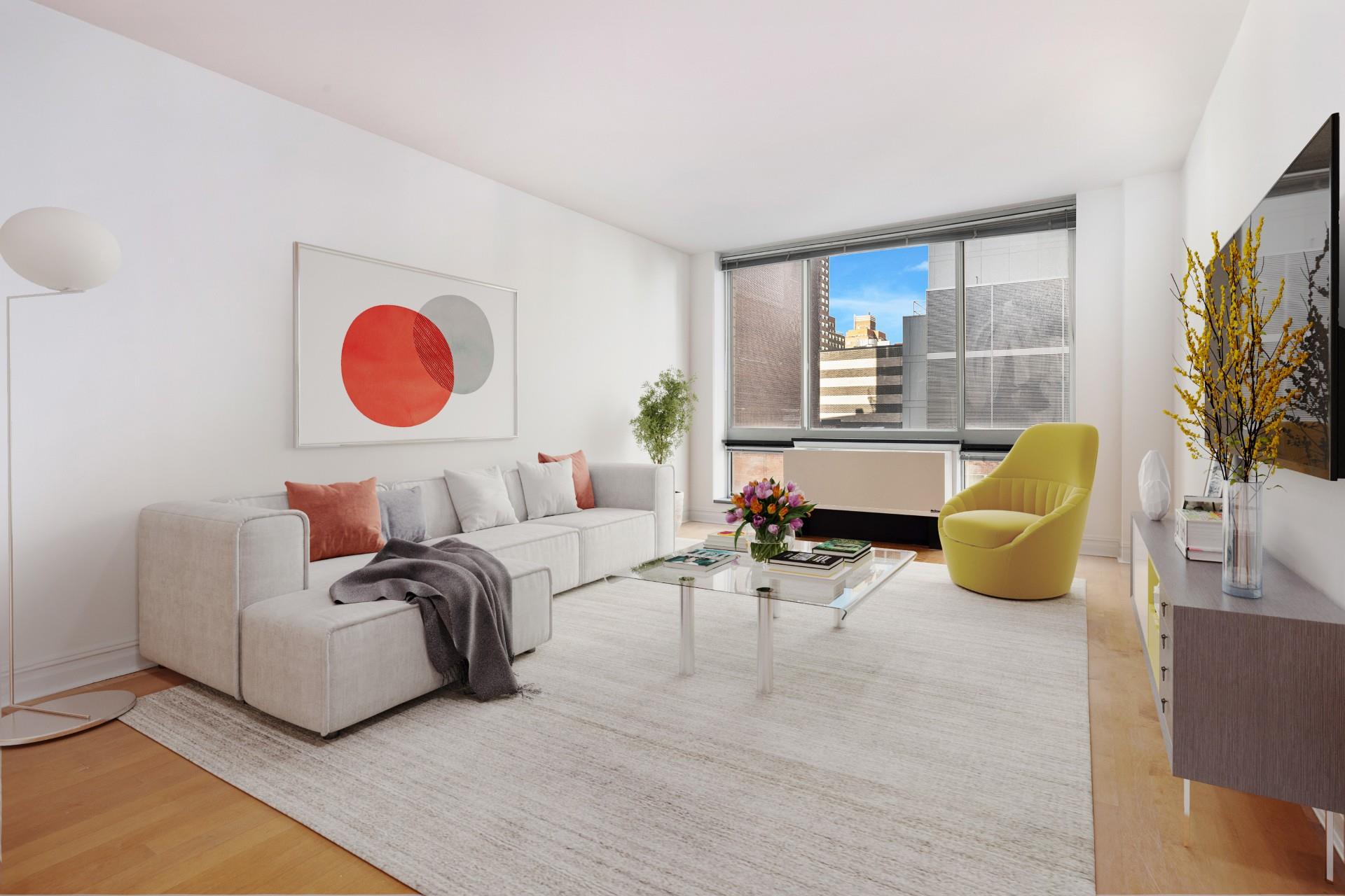 a living room with furniture wooden floor and a large window