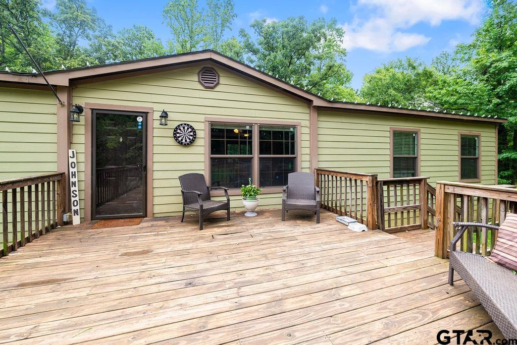 a backyard of a house with seating space