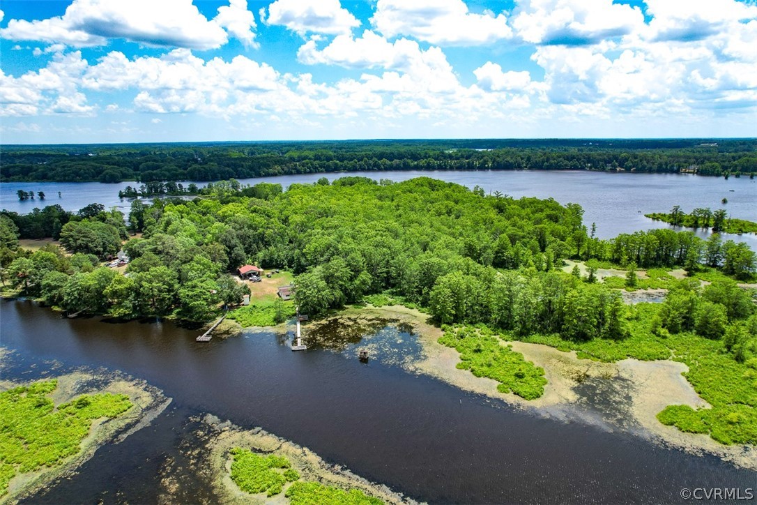 a view of a lake with a garden