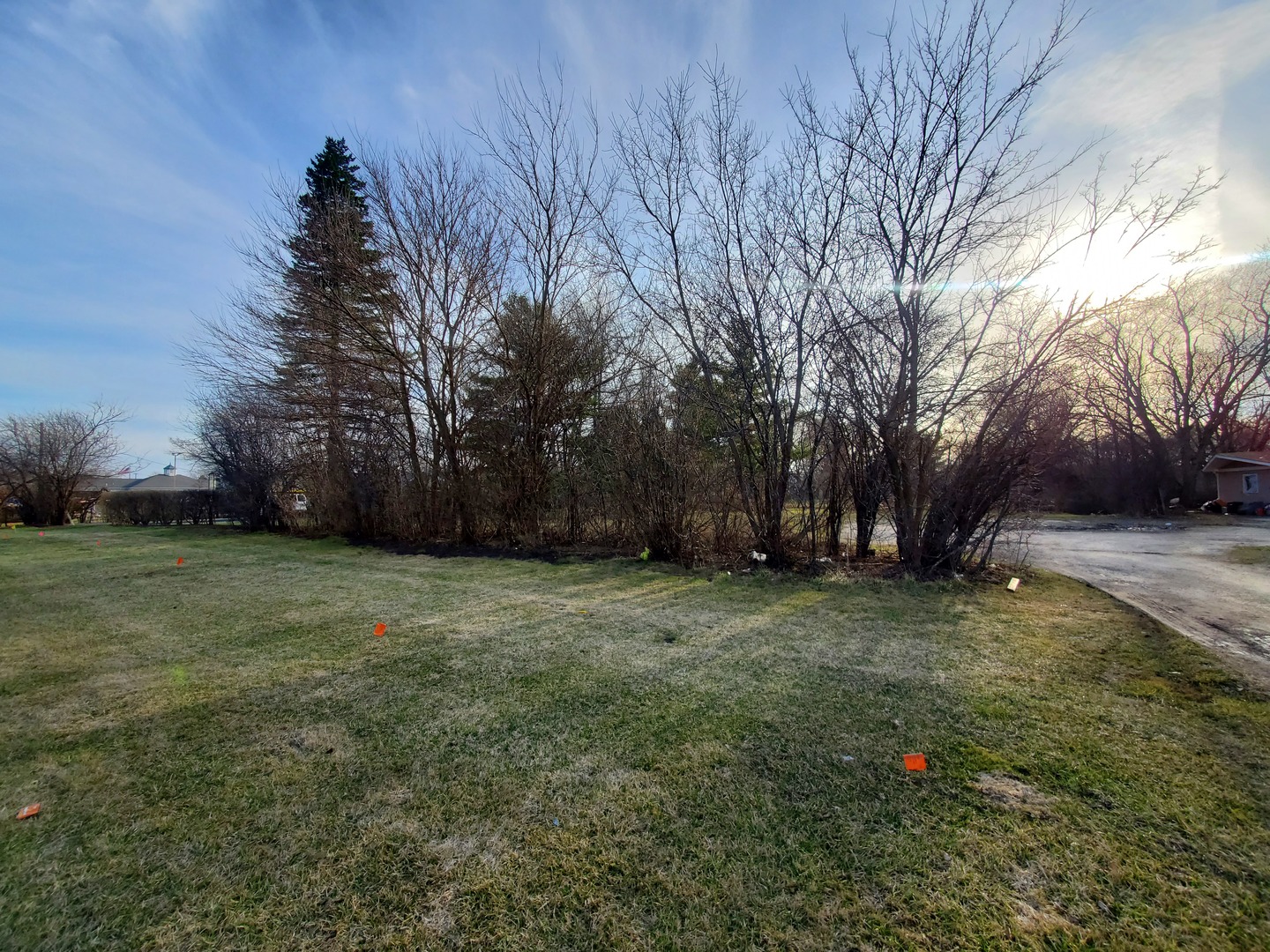 a fire hydrant in the middle of a field