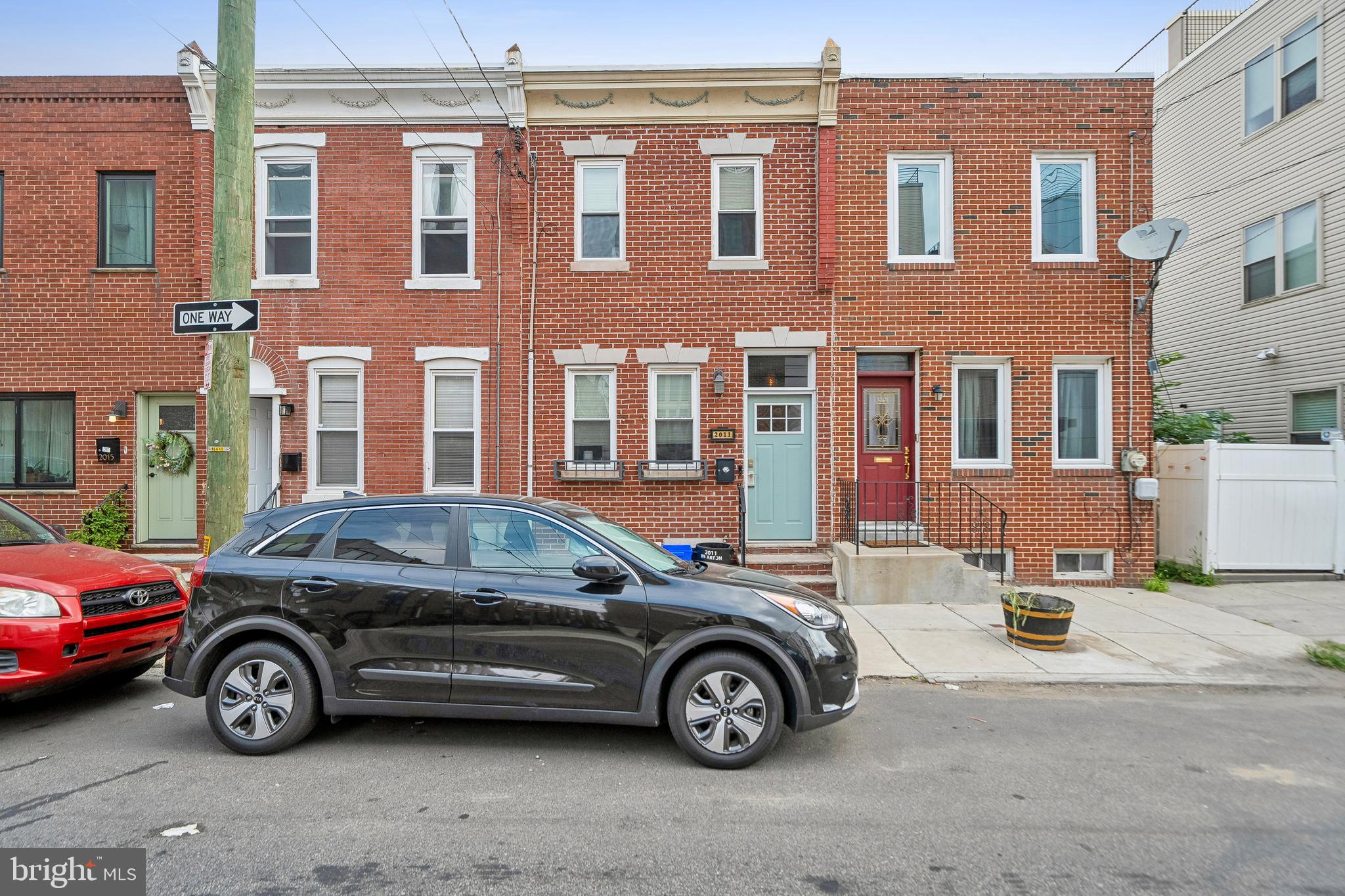 a car parked in front of a building