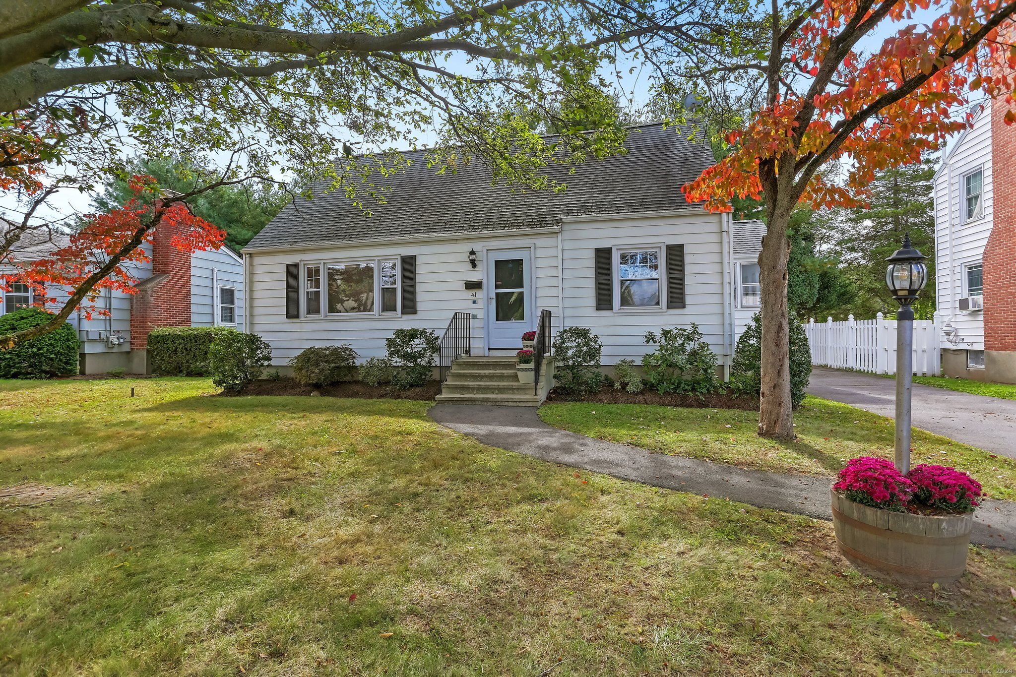 a house view with a garden space