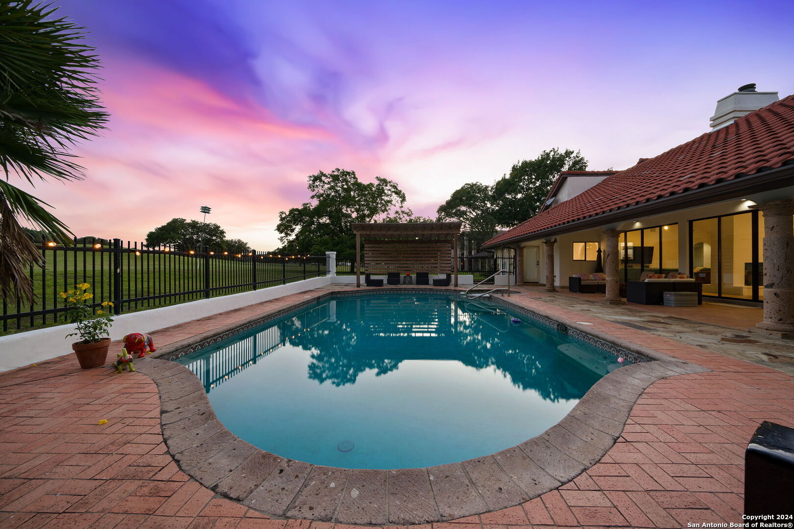 a view of a house with swimming pool