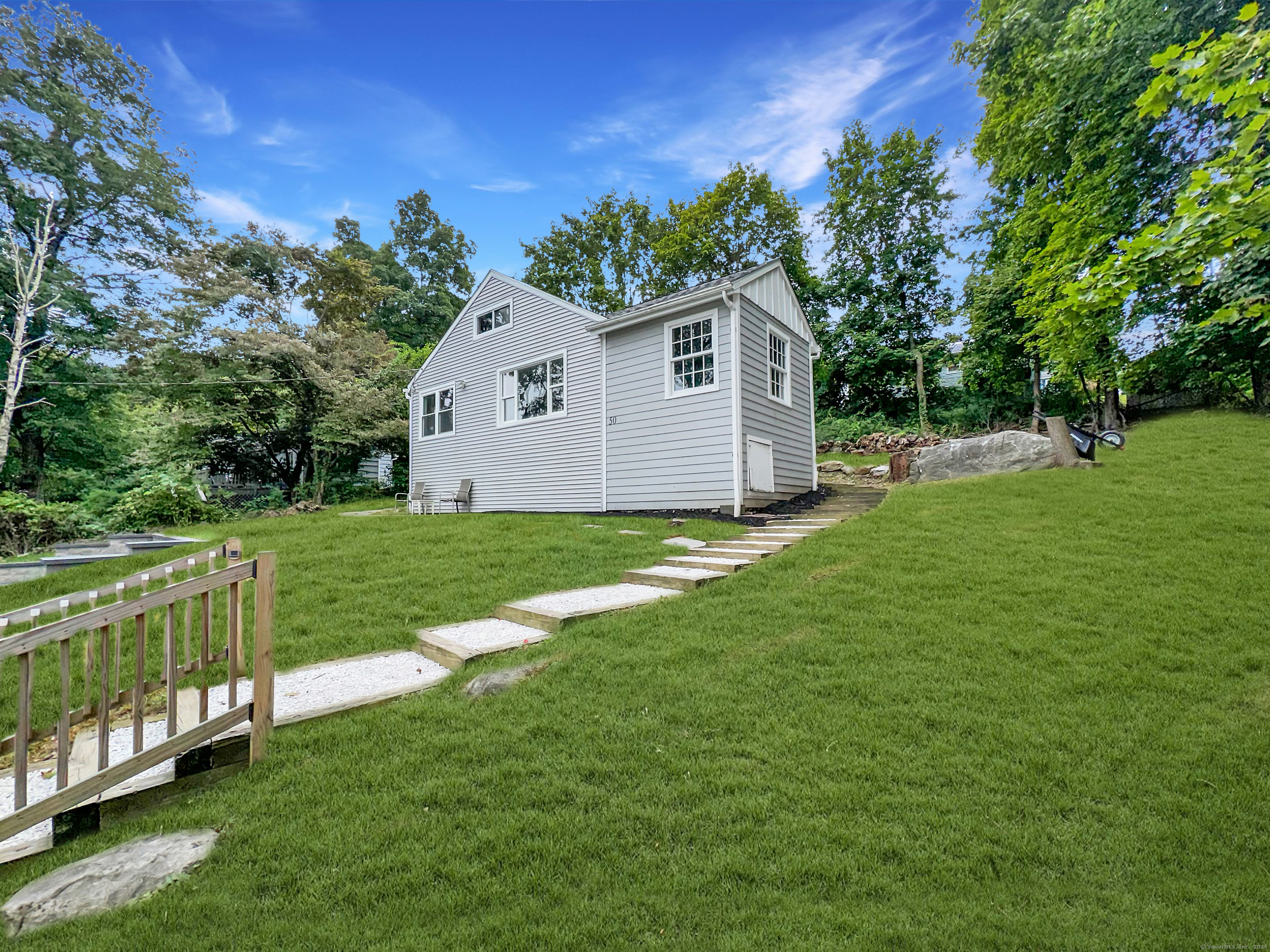 a house view with a garden space