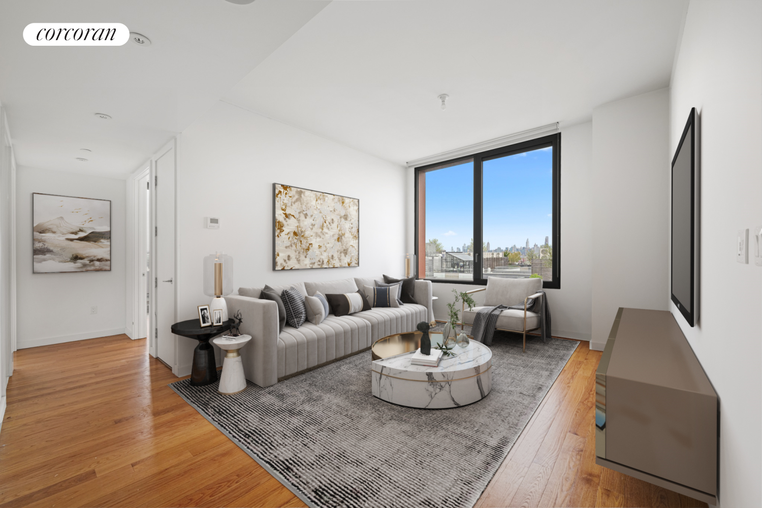 a living room with furniture and a large window