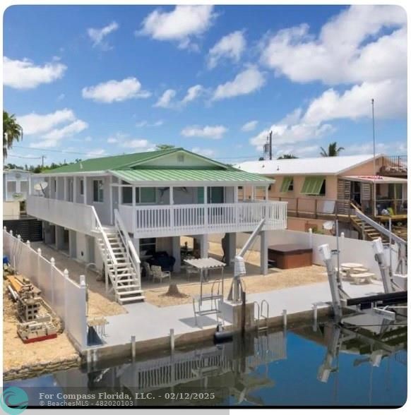 a view of a house with swimming pool