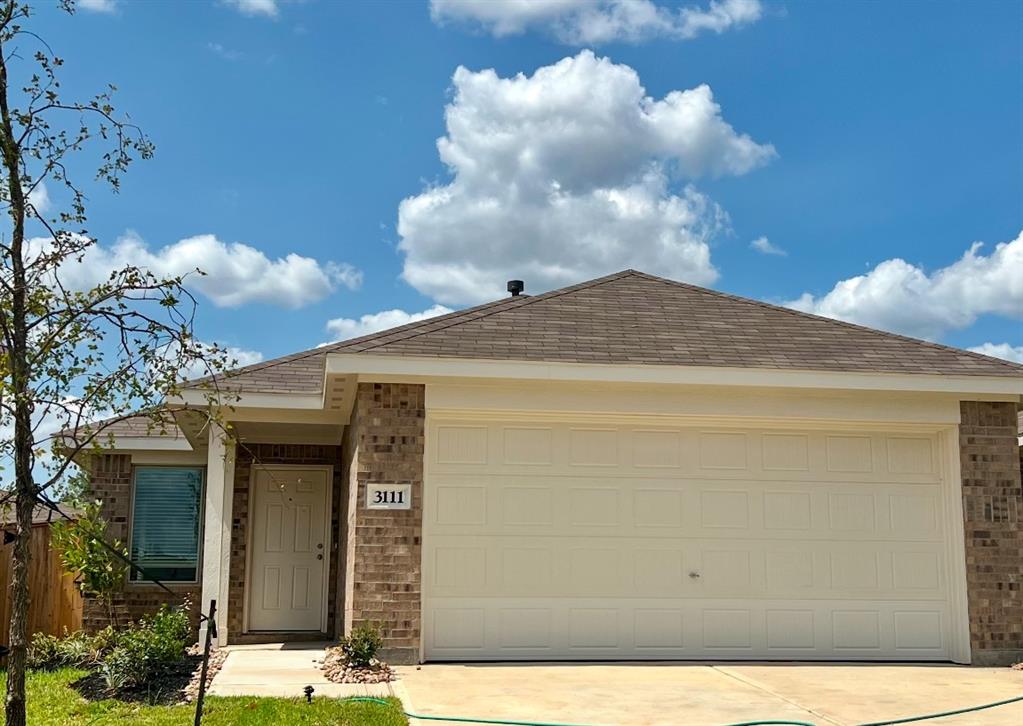 a view of a house with a garage