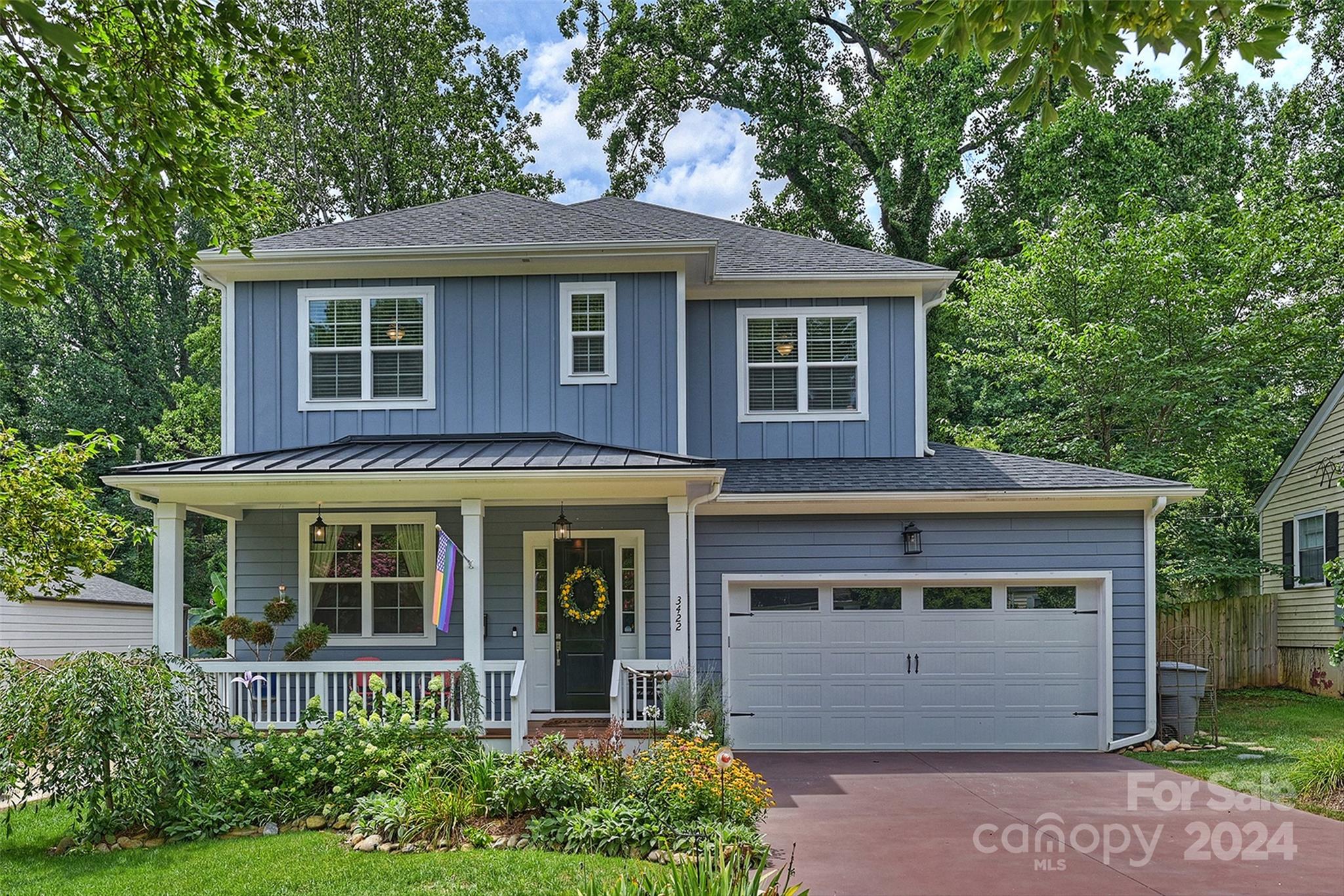 front view of a house with a yard