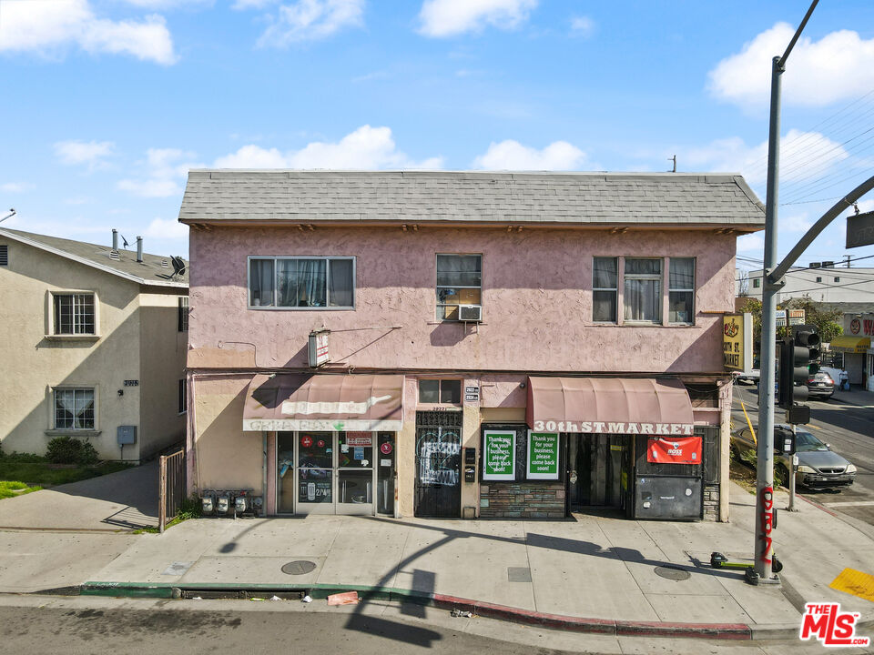 a front view of building with street