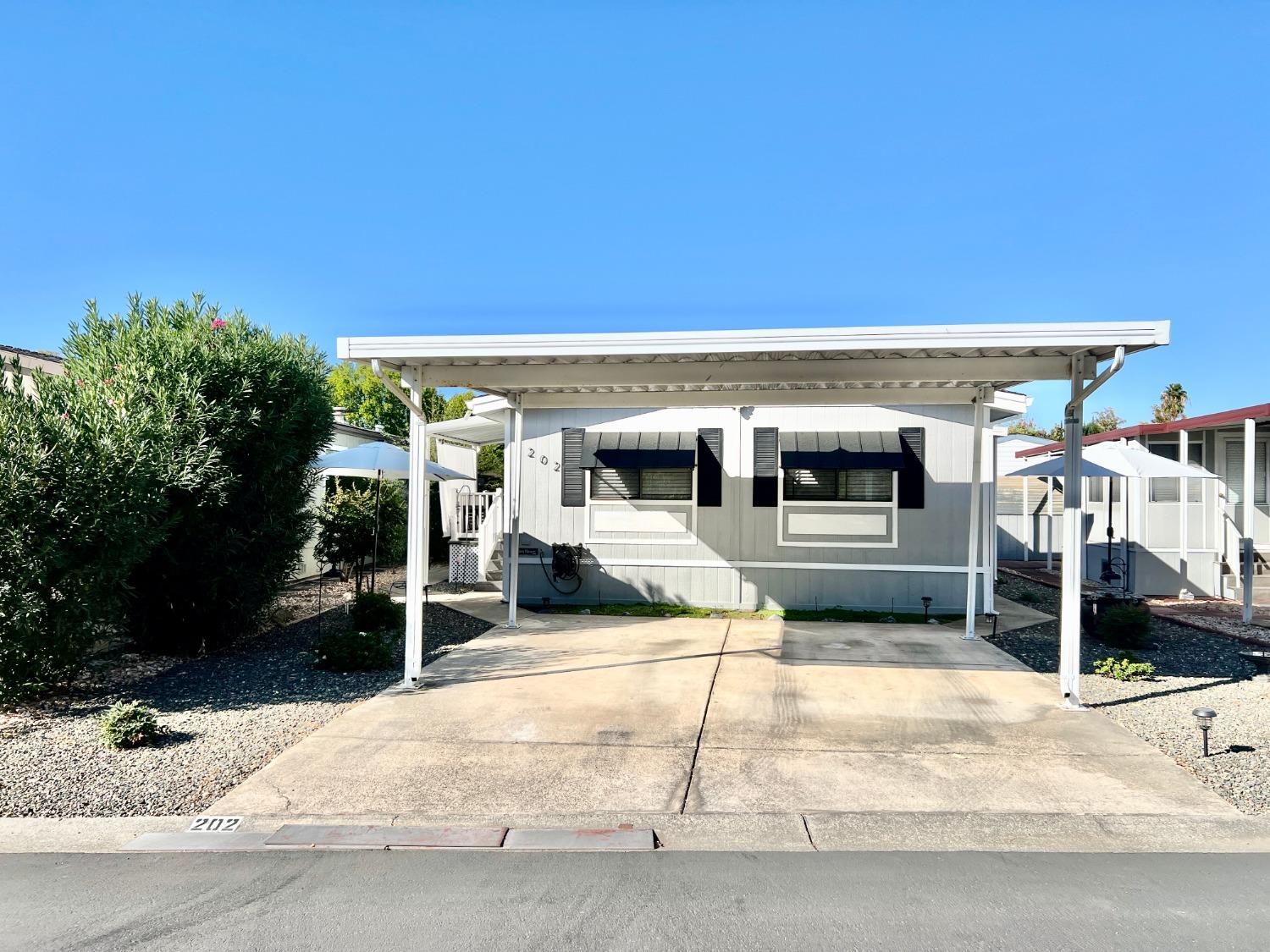 a view of a house with a patio