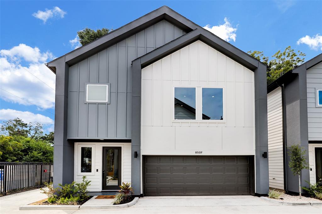 a front view of a house with yard