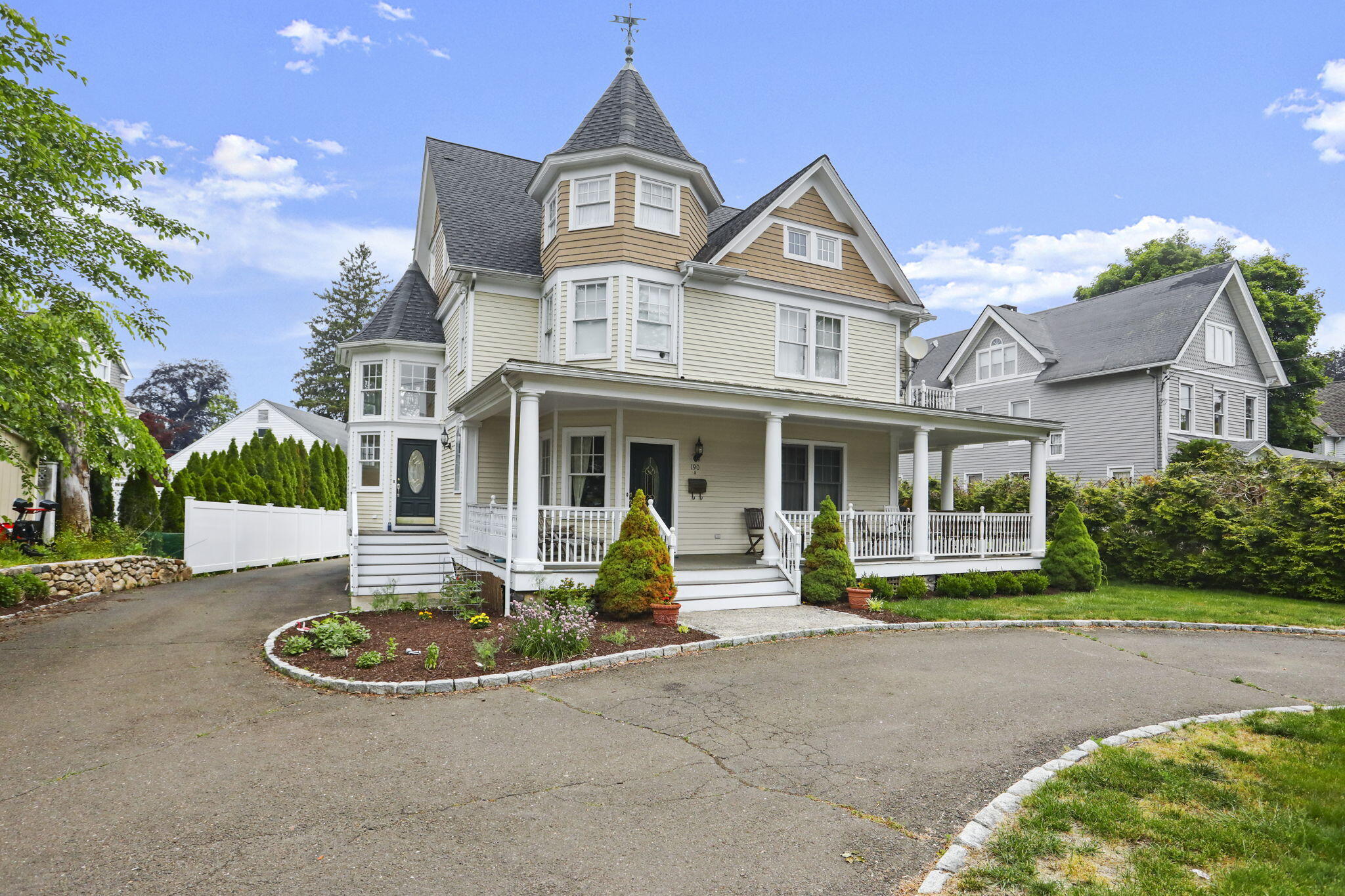 front view of a house with a garden