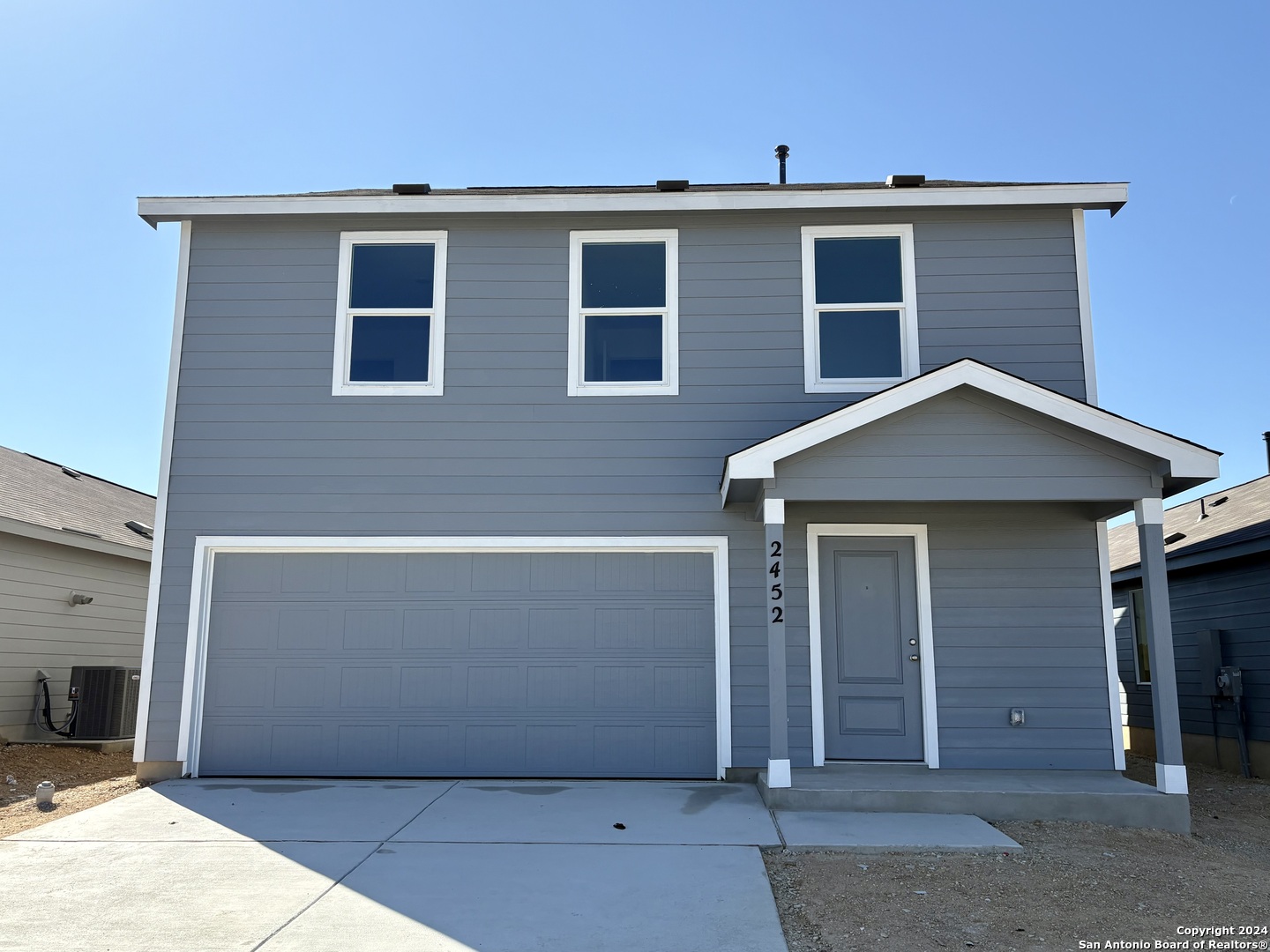 a view of a house with garage