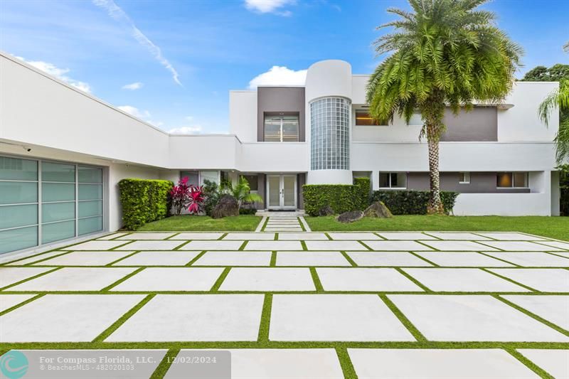 a view of a backyard of the house