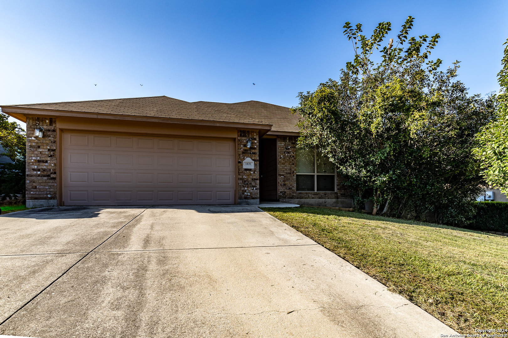 a front view of house with yard