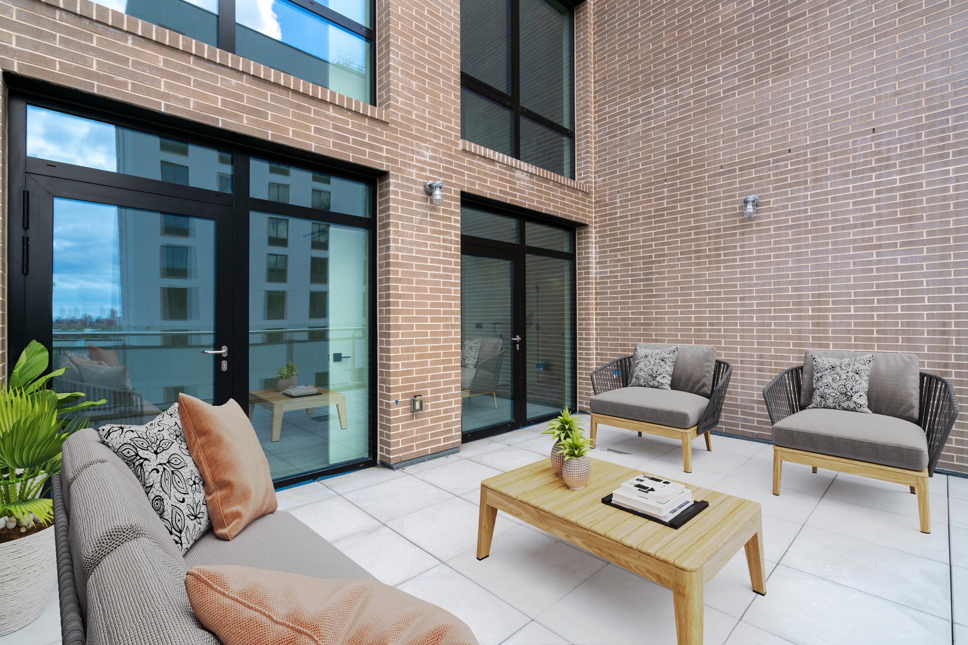 a outdoor living space with furniture and a potted plant