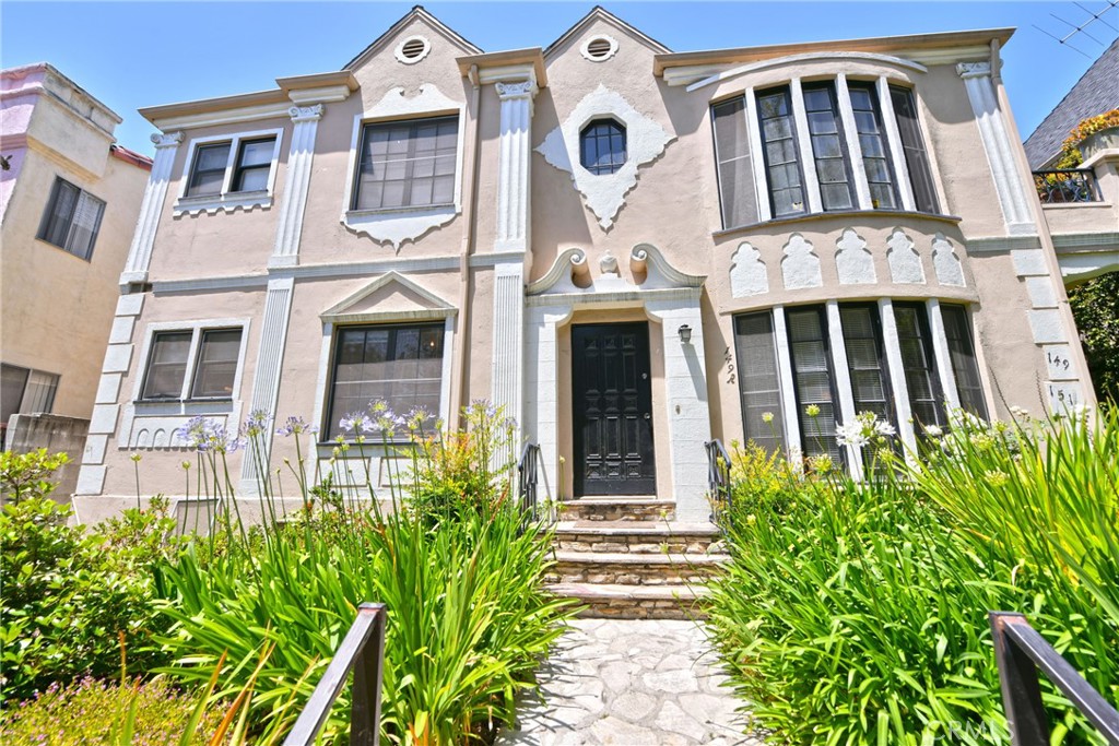 a front view of a multi story residential apartment building