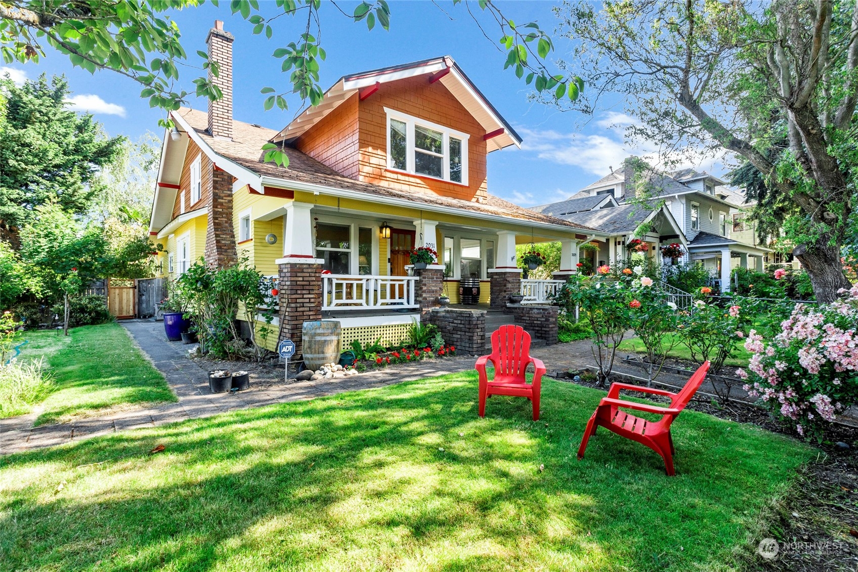 a front view of house with outdoor space and garden