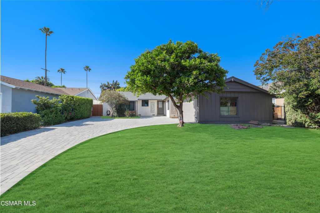 a house view with a garden space