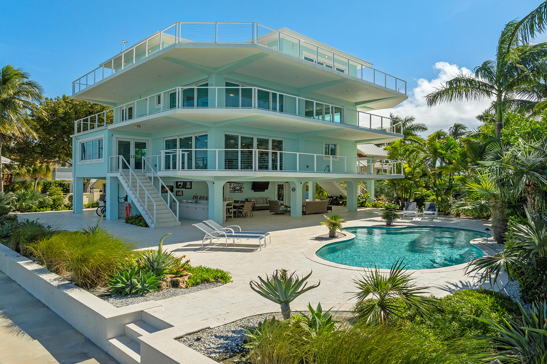 a front view of a house with swimming pool