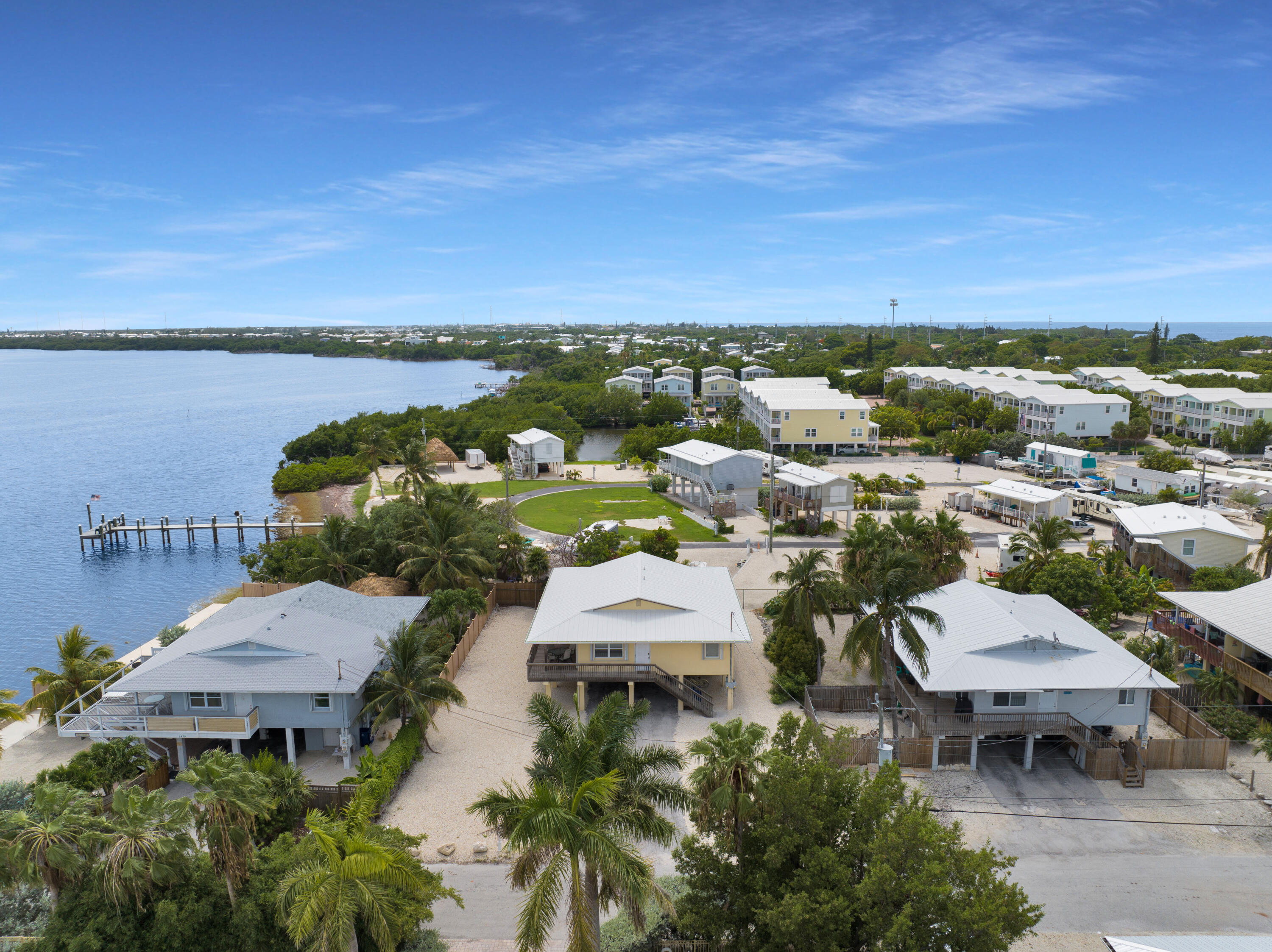 an aerial view of a house with a lake view