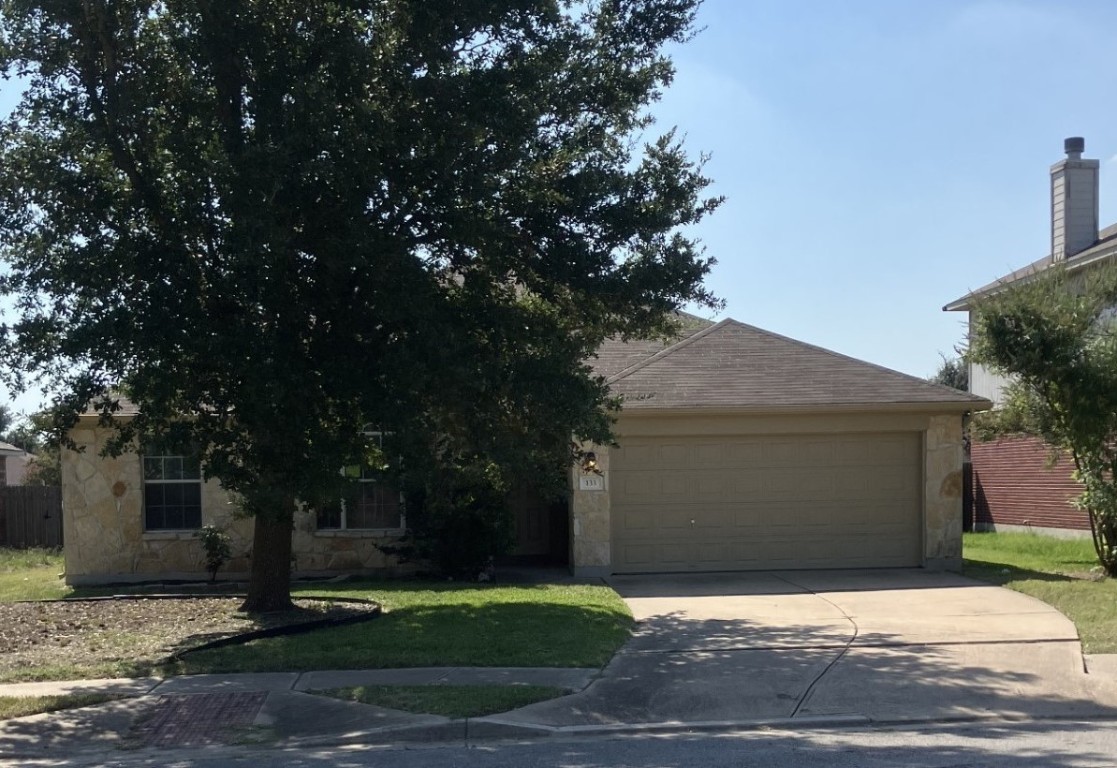 a front view of house with yard