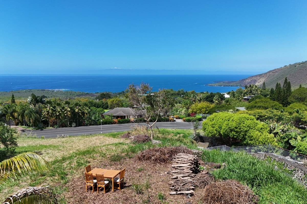 a view of a yard with an outdoor space