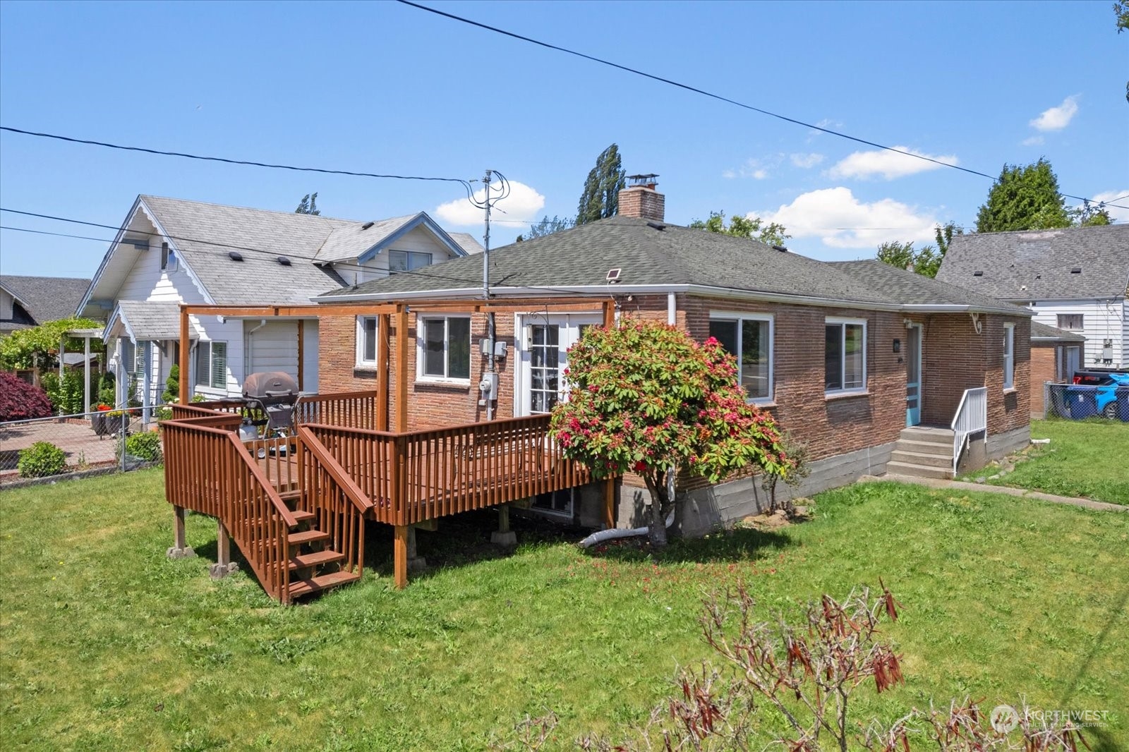 front view of a house with a yard