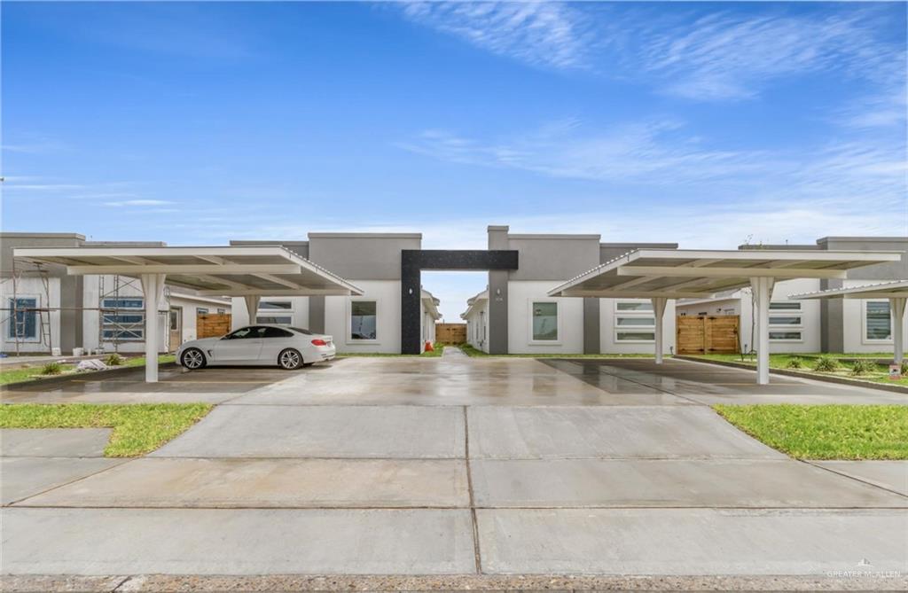 front view of a house with a patio