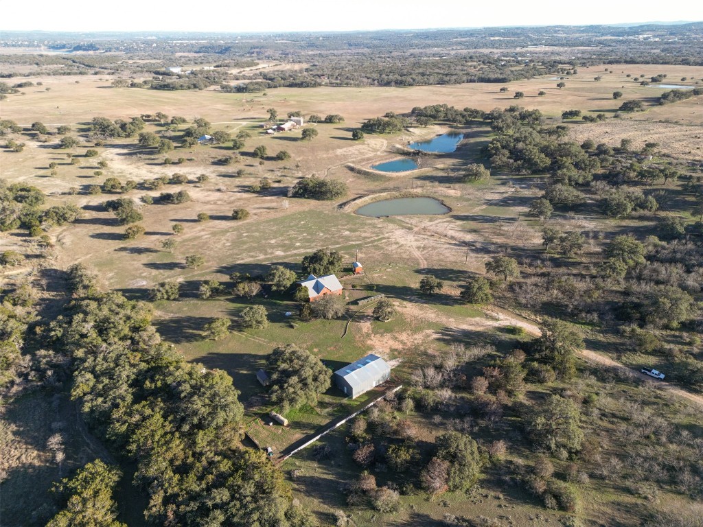 an aerial view of residential building and ocean view