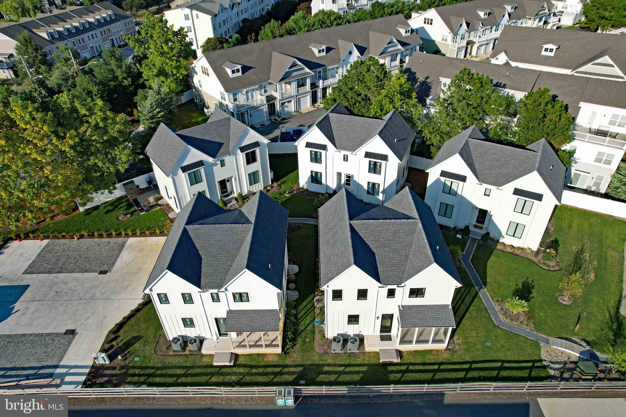 an aerial view of multiple houses