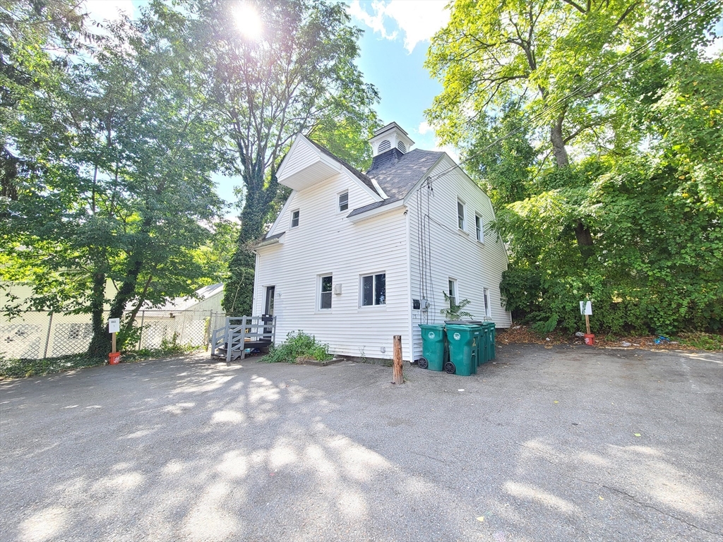 a view of backyard with green space