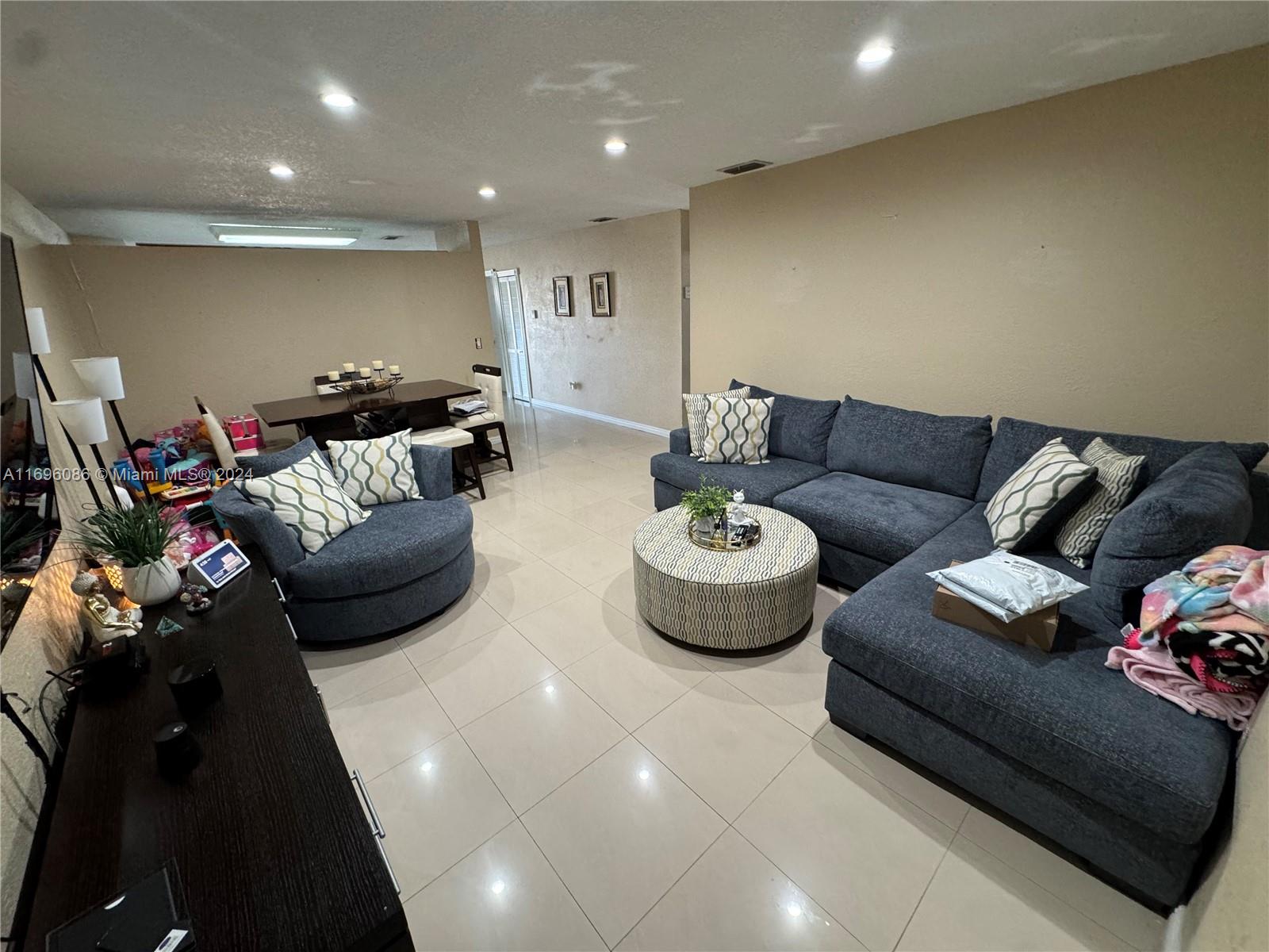 a living room with furniture and a couch