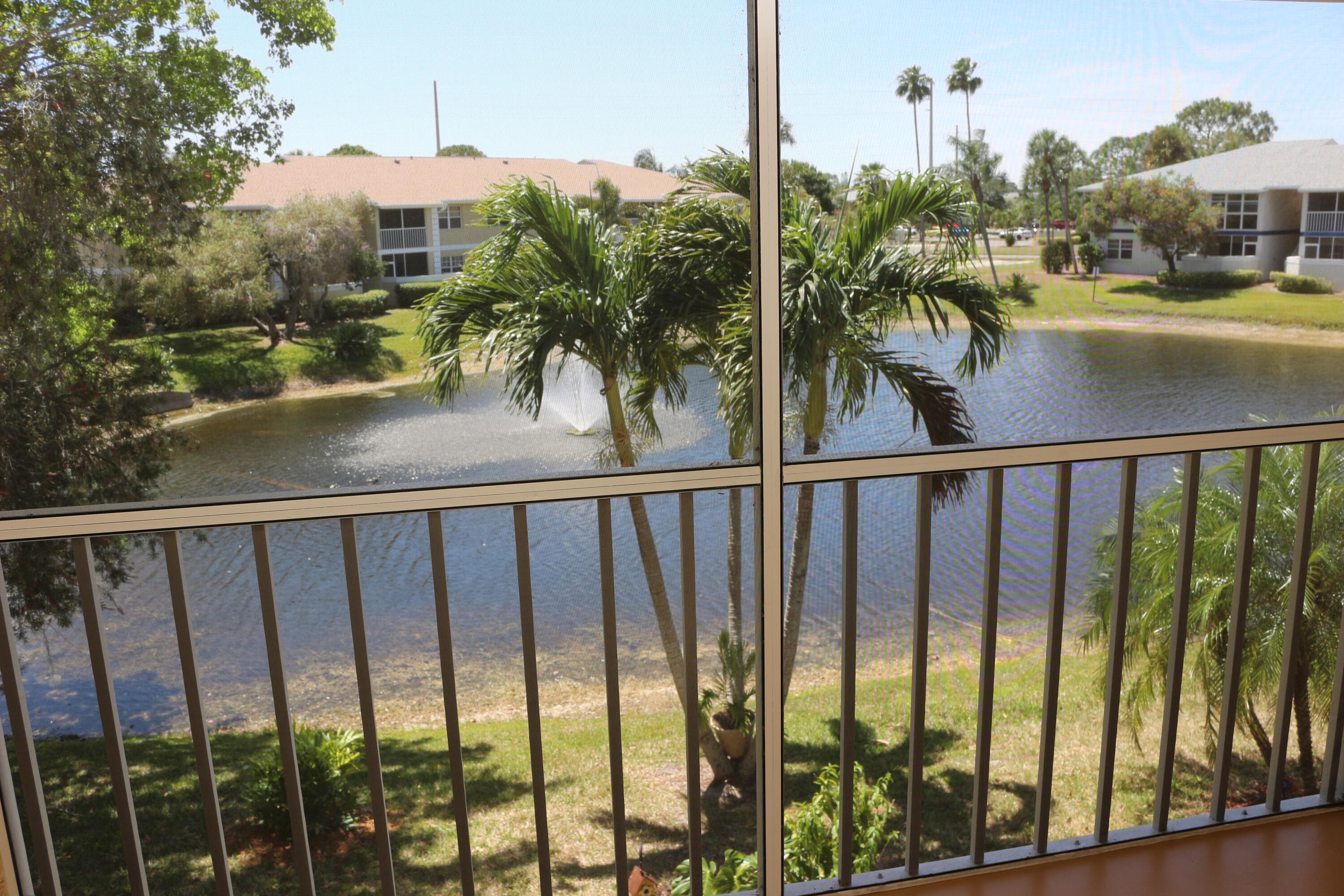 a view of a balcony and lake view