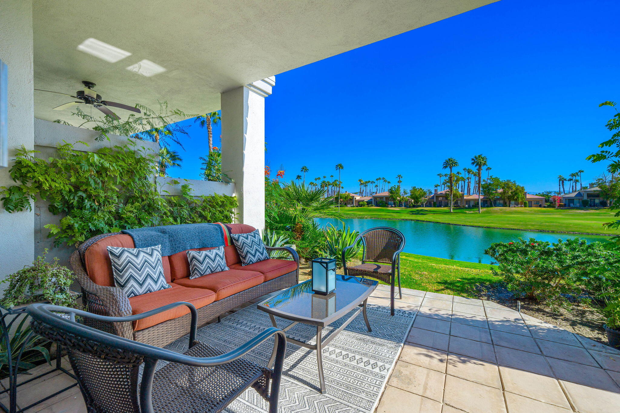 a outdoor living space with furniture and a garden