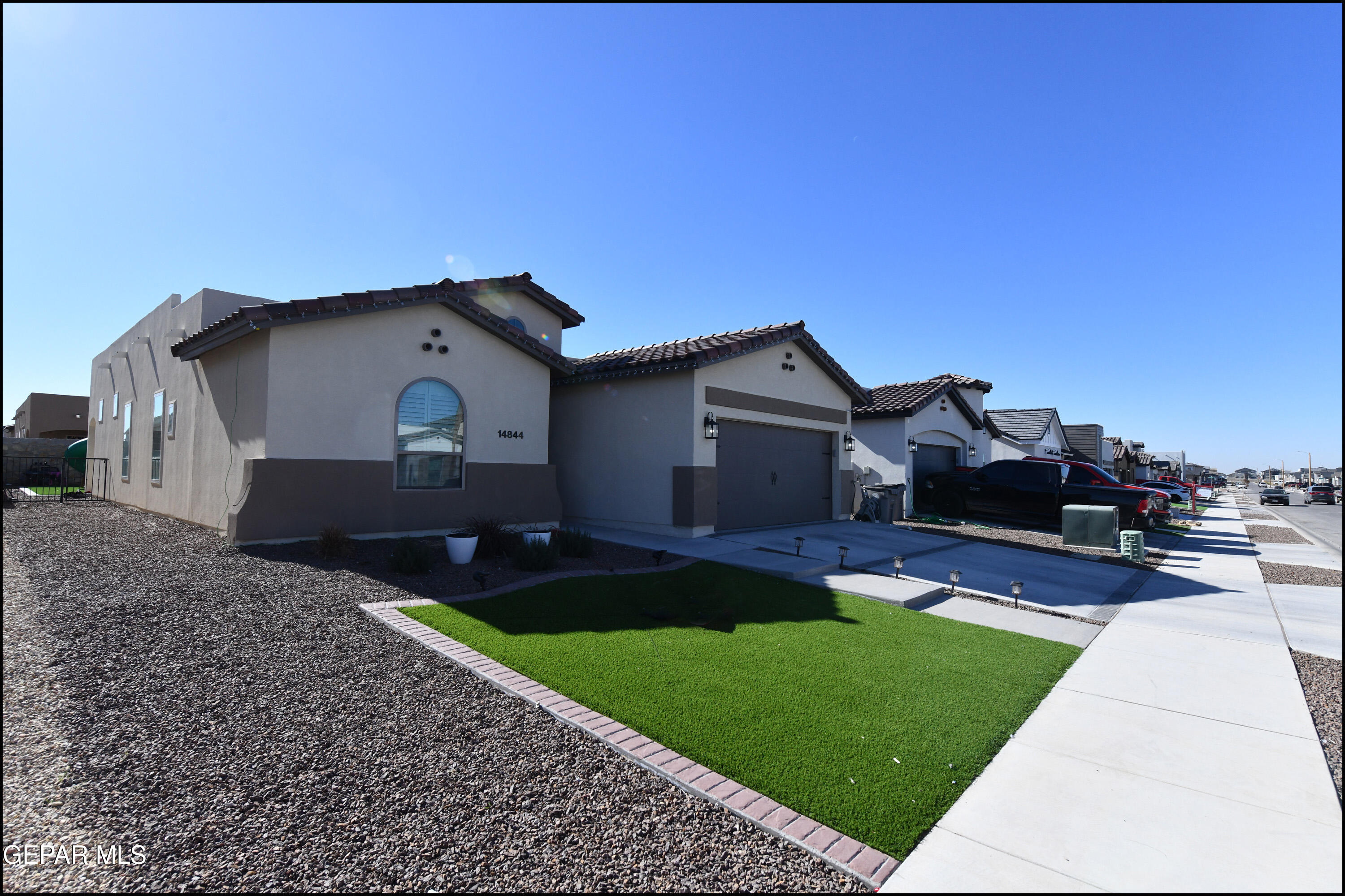 a house view with a garden space