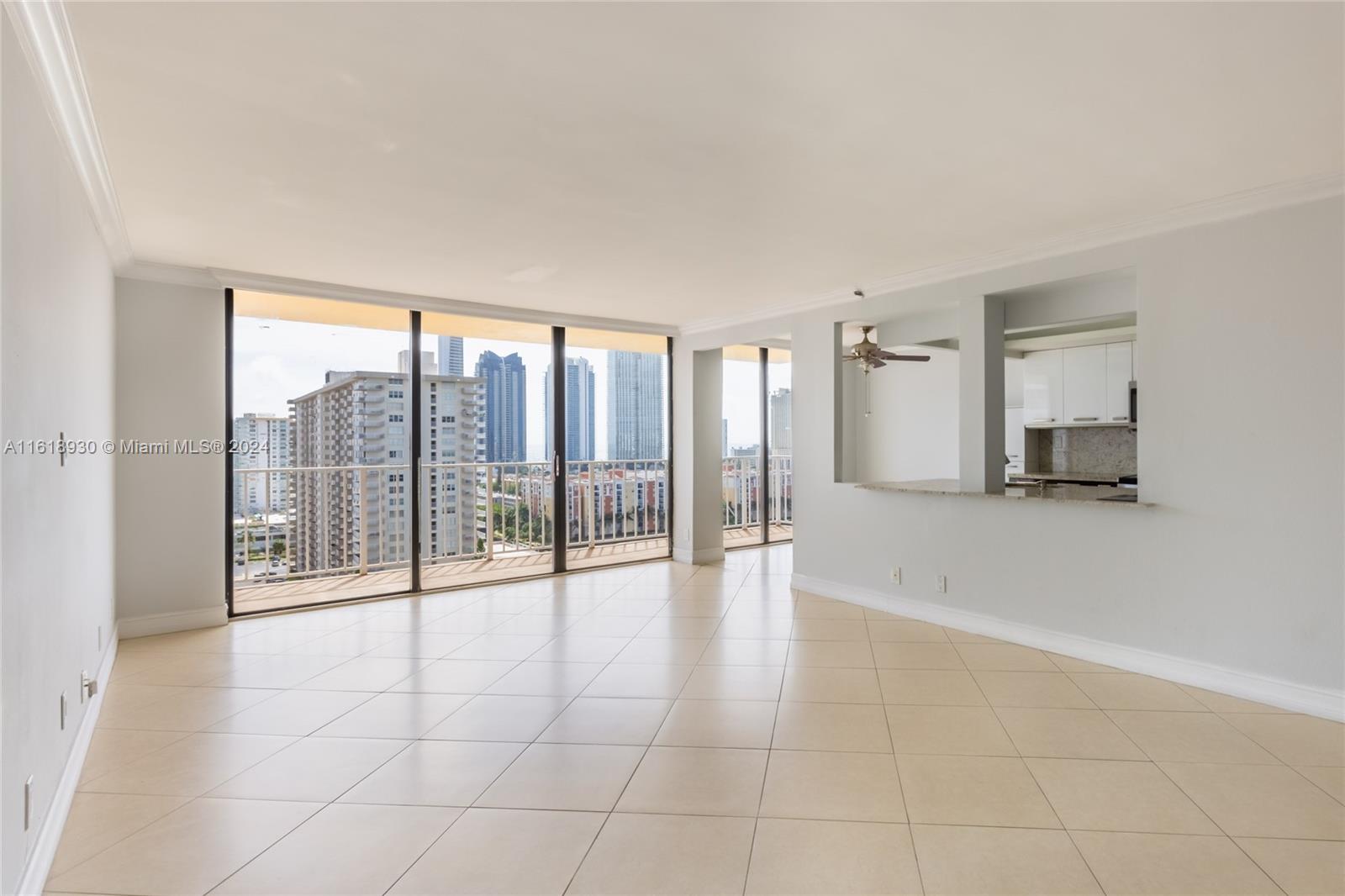 a view of empty room with floor to ceiling window