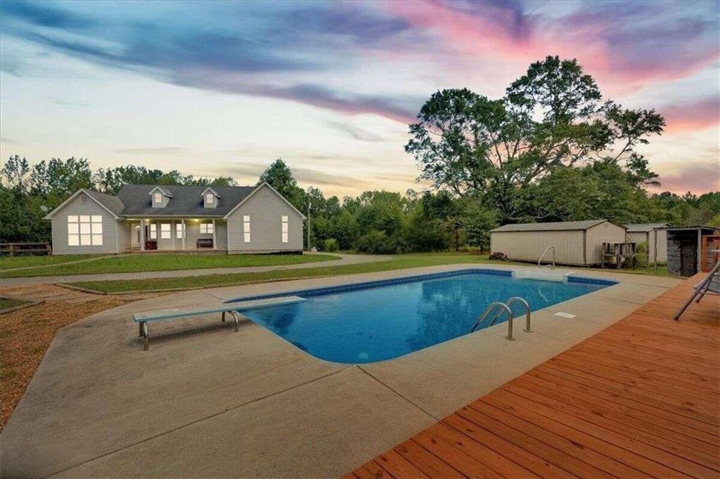 a view of a house with a swimming pool