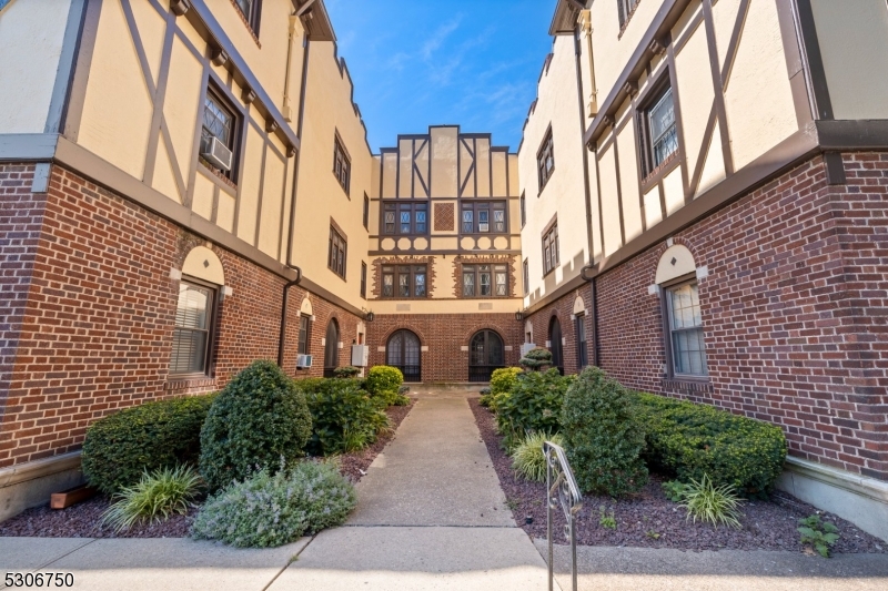 a view of a building with pathway