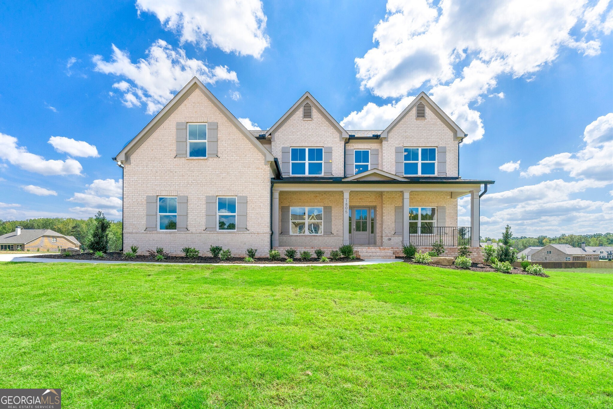 a view of a house with a big yard