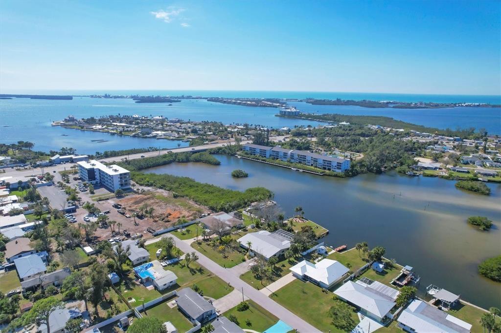 an aerial view of lake residential house with outdoor space