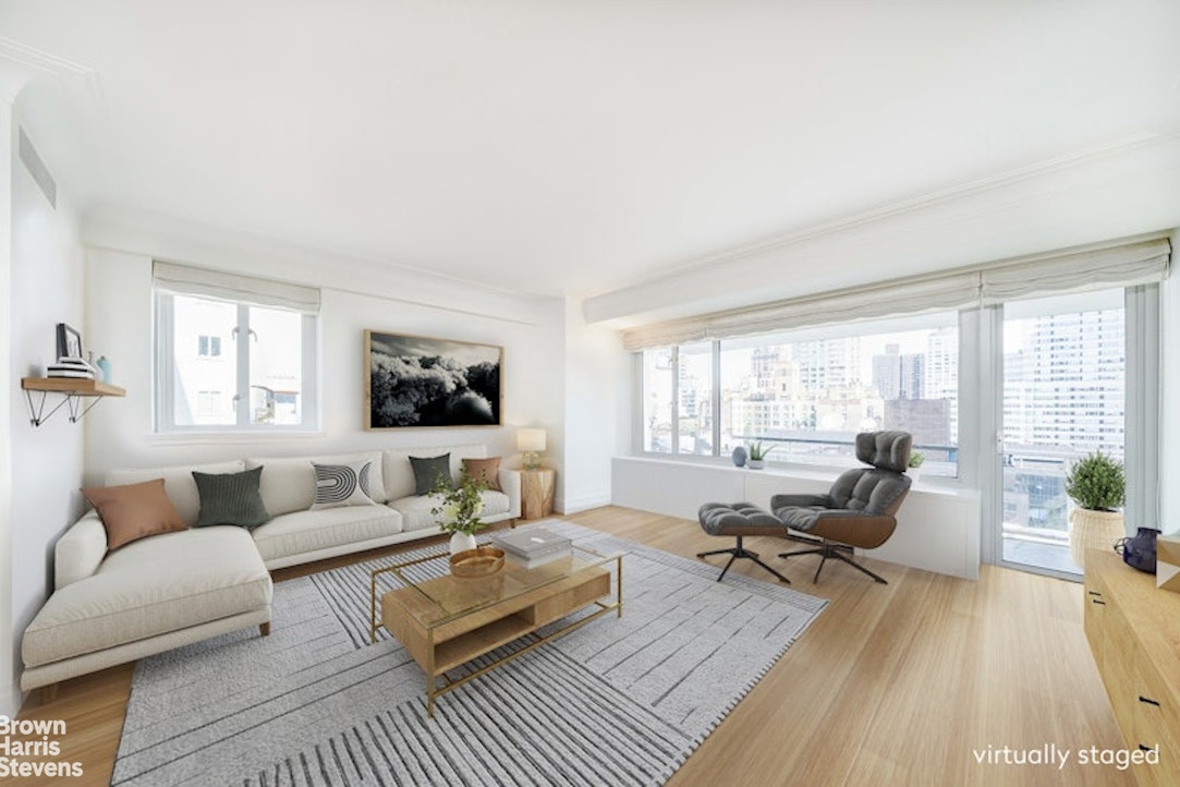 a living room with furniture and a couch