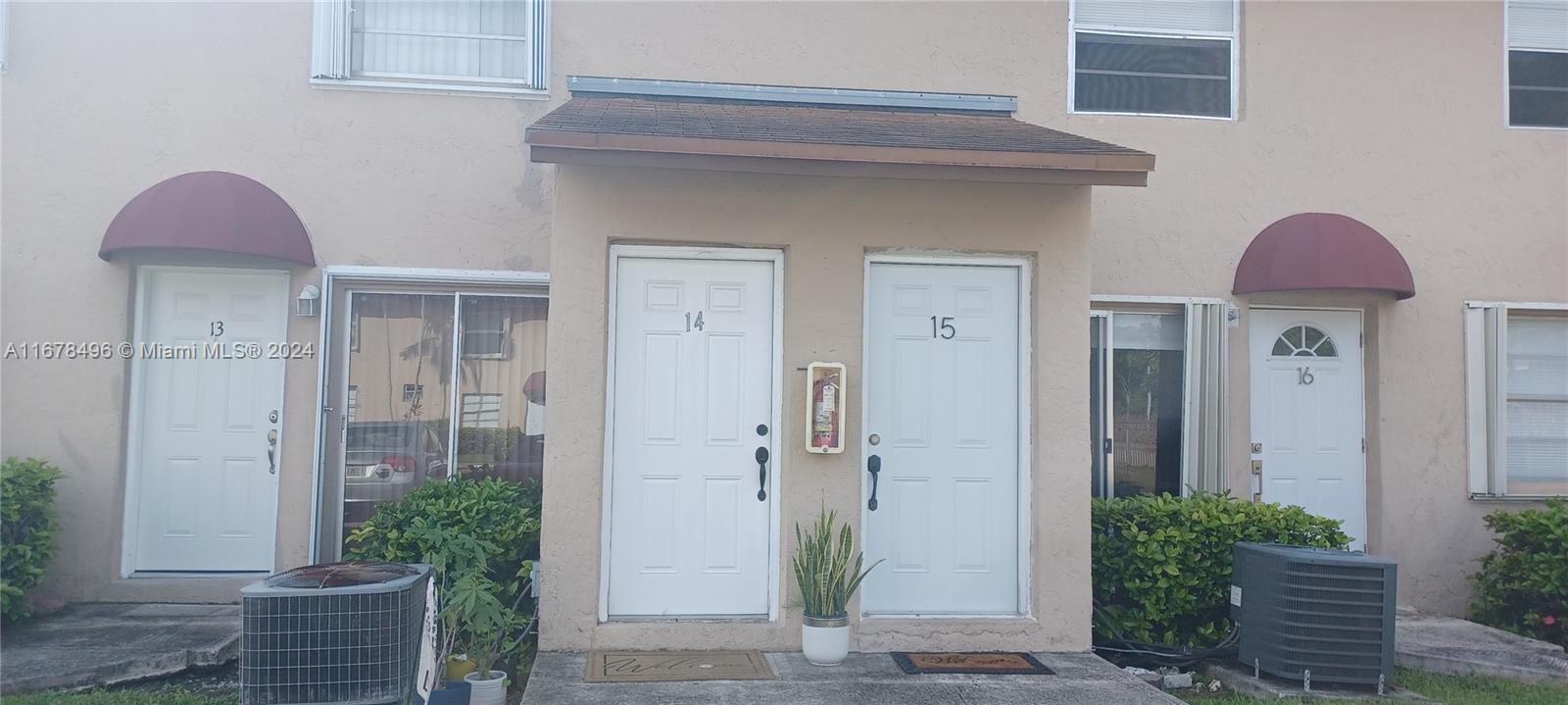 a front view of a house with yard