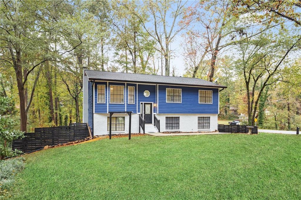 front view of a house with a yard