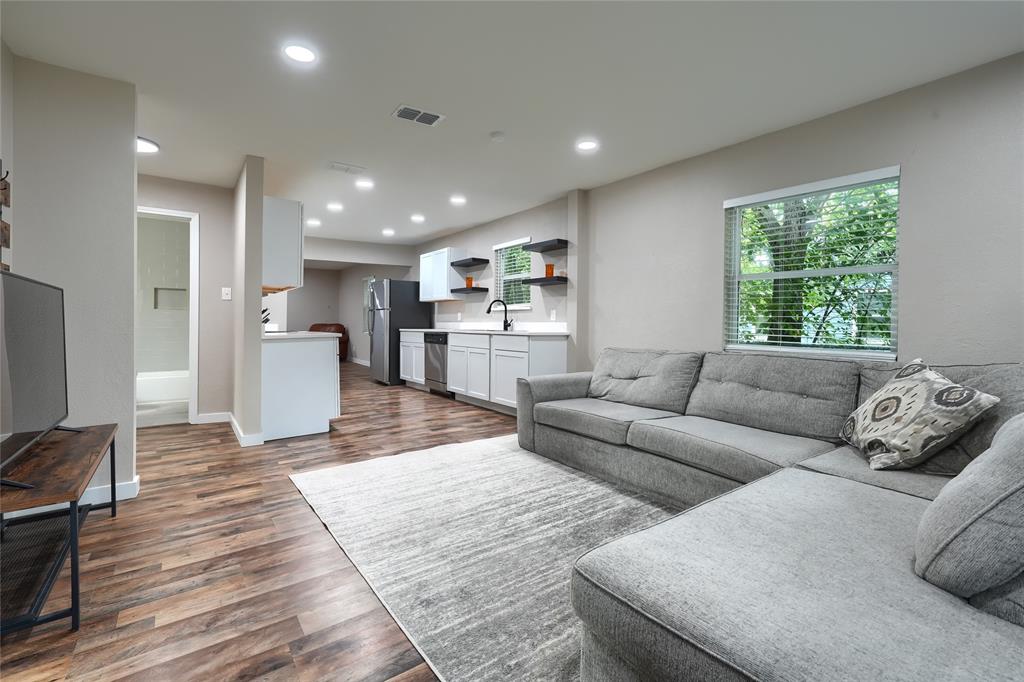 a living room with furniture and a couch