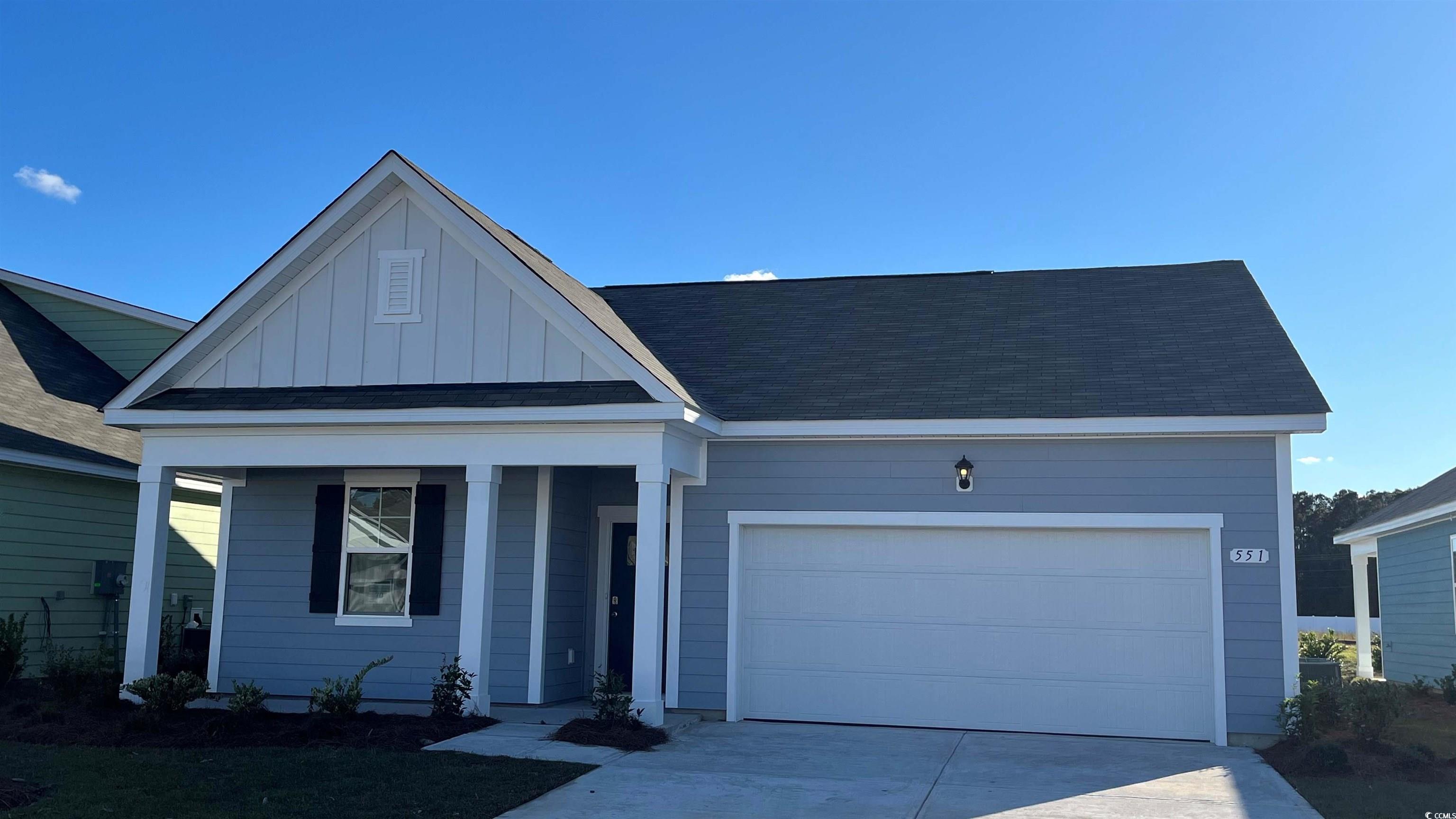 View of front of house with a garage