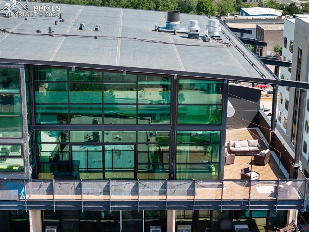 a aerial view of a house with a balcony